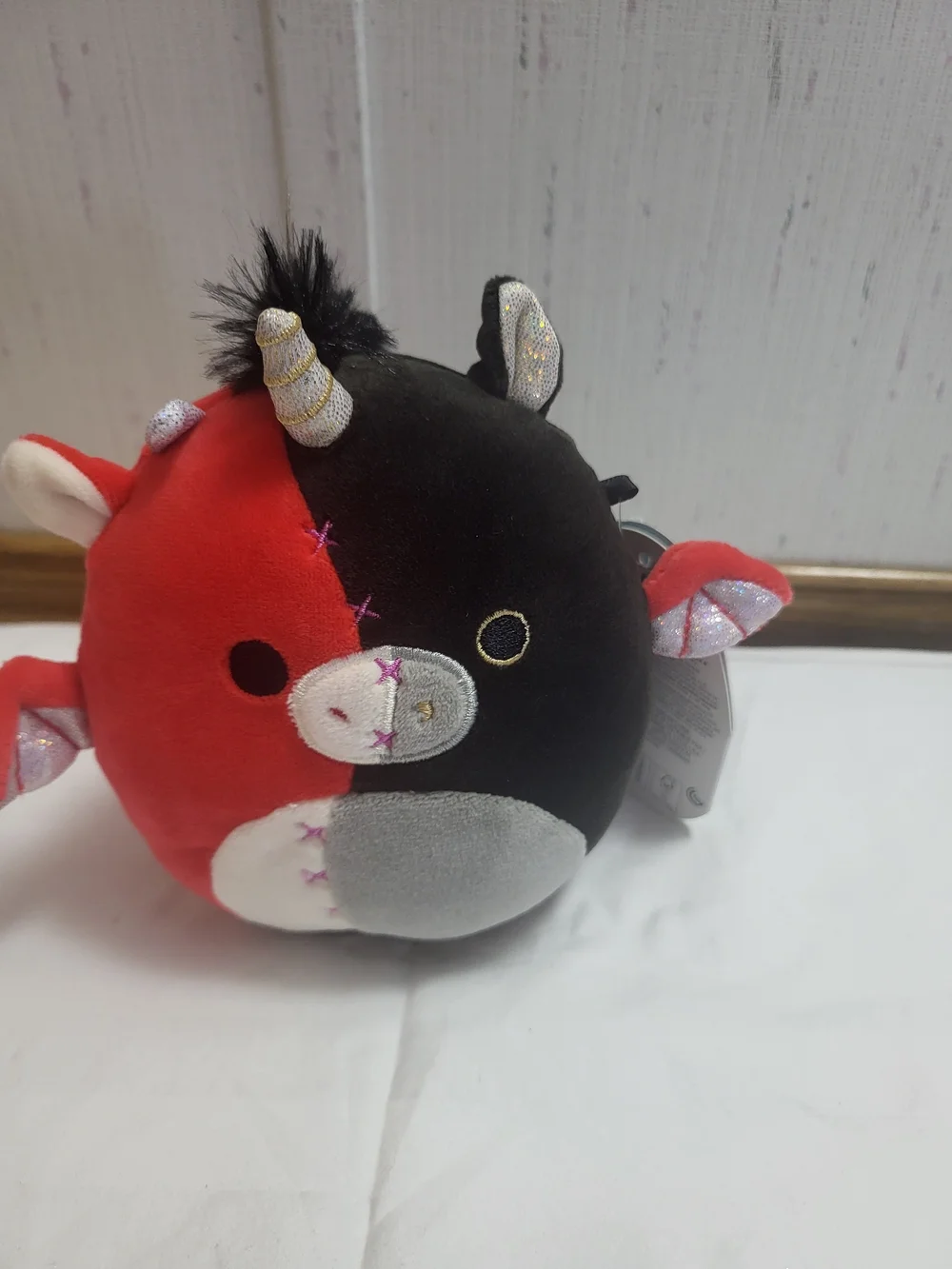 Squishmallows Red and Black Unicorn Cow Plush